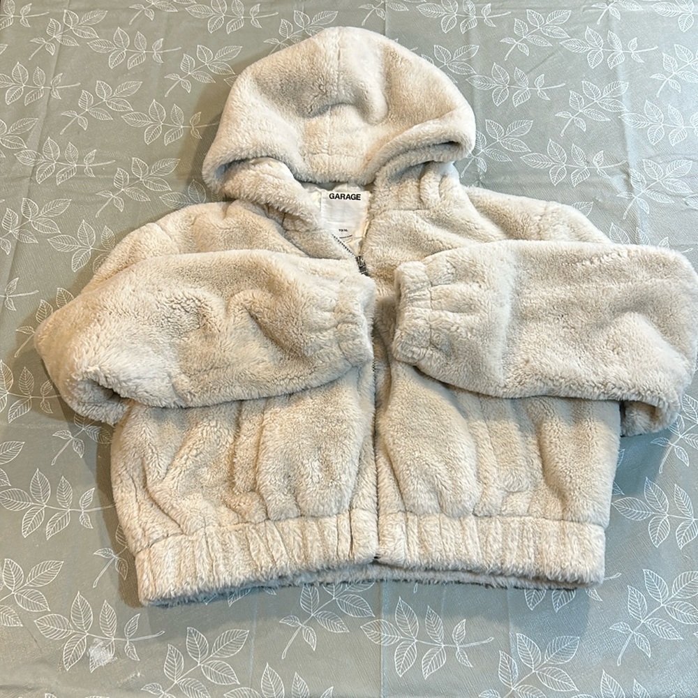 Ladies Garage Zip Up Sweaters.
